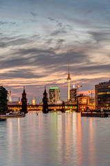 Dawn at the river Spree in Berlin with the Television Tower in the back