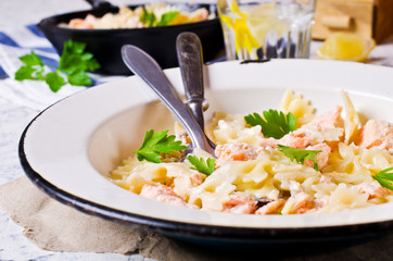 Pasta farfalle with salmon