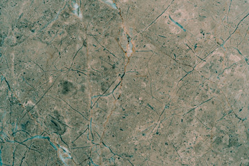 brown marble stone seamless background pattern or texture