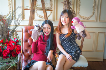 Two cute girl and Playing with Sock Puppets