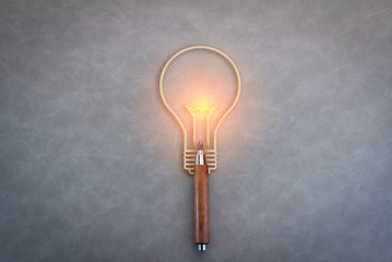 Creative ideas icon with a pencil and a lightbulb