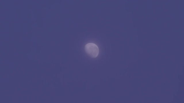 Full shot of the moon in early hours of the day