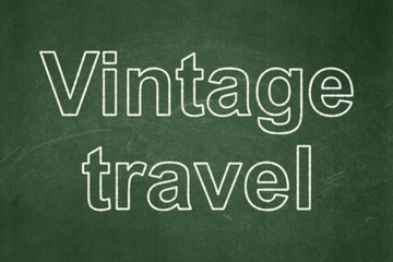 Fototapeta premium Vacation concept: Vintage Travel on chalkboard background