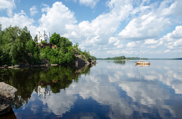 Landscape with a chapel over lake