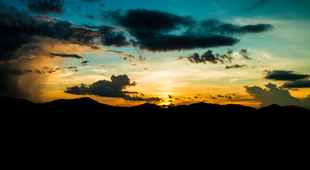 sunset with cloud on mountains in Thailand
