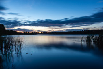 Beautiful cloudscape over the lake, sunset shot