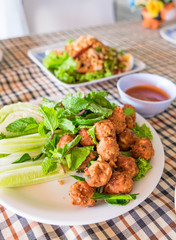 pork ball lap spicy hot chili and sauce on table