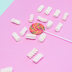 Obraz premium Lollipop and chaotic scattered marshmallow