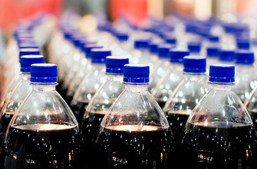 Rows of plastic bottles in the store