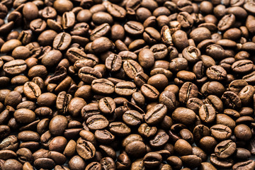 coffee beans on white wooden background
