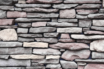 Old stone brick wall background.