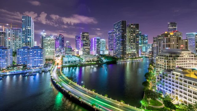 Miami, Florida, USA downtown cityscape and bay at night.