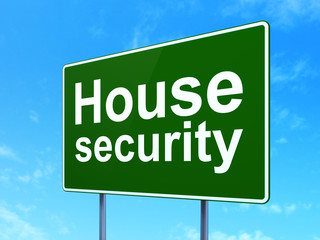 Safety concept: House Security on road sign background