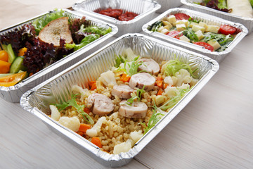 Healthy food in boxes, diet concept.