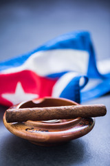 cuban cigar in ash tray
