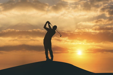 silhouette of golfers hit sweeping and keep golf course in the s