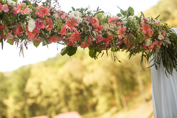 Fototapeta premium The wedding archway with flowers