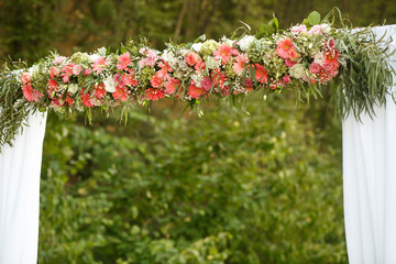 Fototapeta premium The wedding archway with flowers