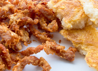 fried pork and grilled sticky rice dipped egg