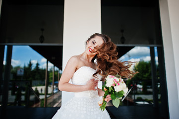 Naklejka premium Portrait of beautiful sensual young bride at wedding hall