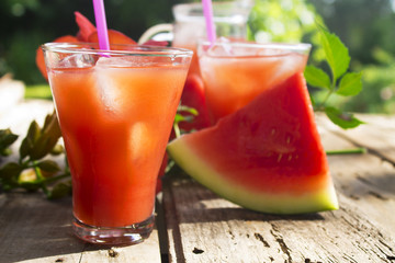 watermelon juice on wooden background