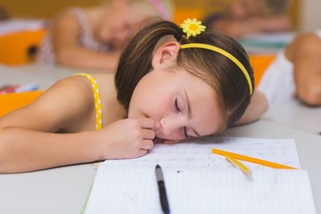  Schoolgirl sleeping at desk