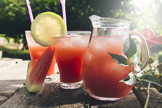 watermelon juice on wooden background