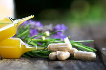 natural medicine products on wooden background