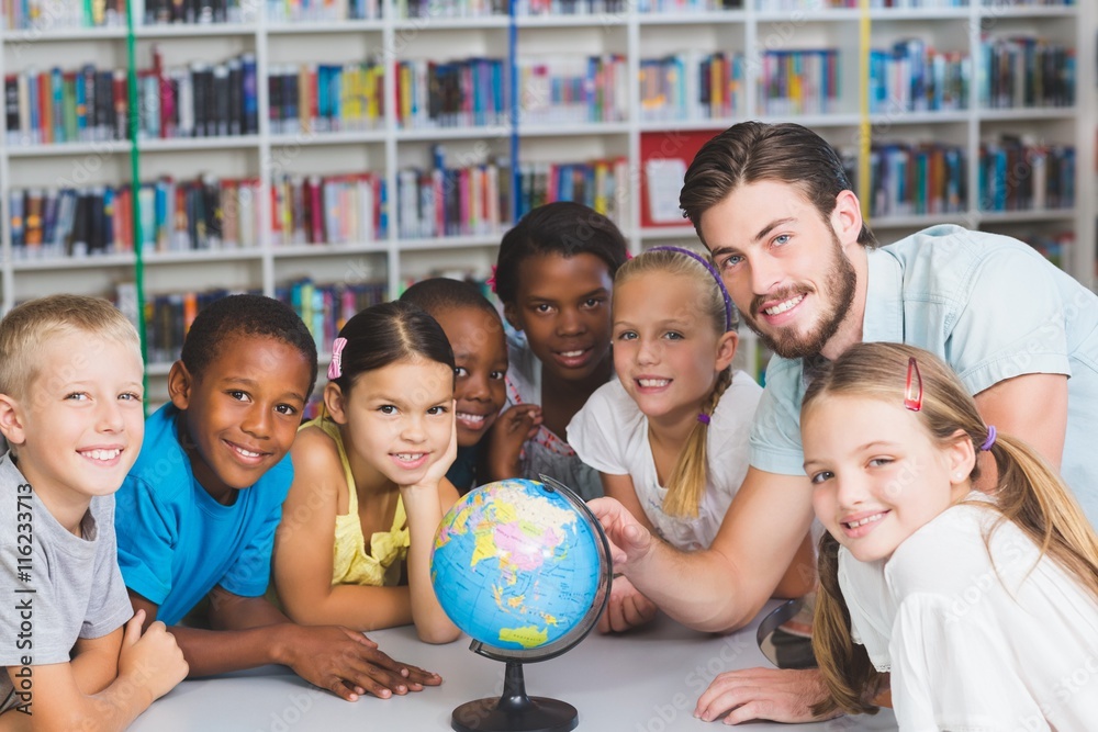 Poster pupils and teacher looking at globe in library