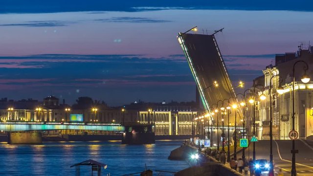 Span of the Liteyny Bridge is lifted over the river Neva timelapse
