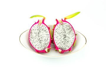 Dragon fruit in bowl on white background