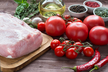 Raw pork meat with freash vegetables