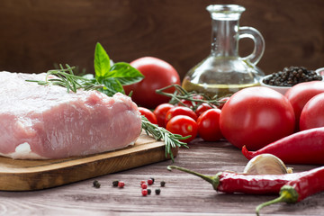 Raw pork meat with freash vegetables
