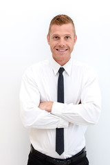 Portrait of young happy smiling business man, isolated over white background