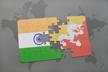 puzzle with the national flag of india and bhutan on a world map background.