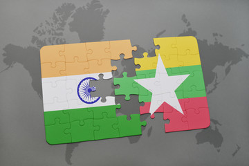puzzle with the national flag of india and myanmar on a world map background.
