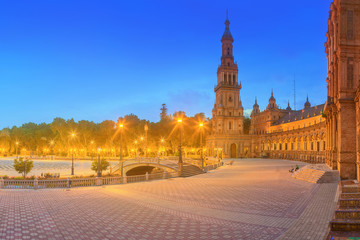 Fototapeta premium View of Spain Square on sunset, landmark in Renaissance Revival style, Seville, Spain