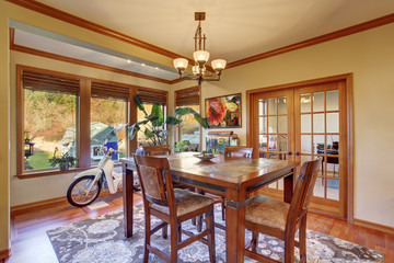 Dining area with hardwood floor. Wooden table set