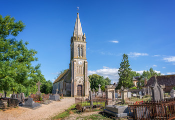 Fototapeta na wymiar Picturesque church and cemetery of St Pair du Mont in Normandy, France