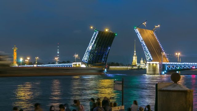 View of the open Palace Bridge timelapse, which spans between - the spire of Peter and Paul Fortress
