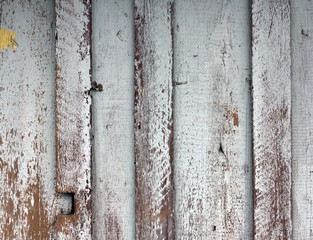 Weathered painted wooden wall texture.