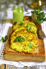 Zucchini fritters with garlic and carrot.