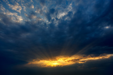 Dramatic sunset with sun rays