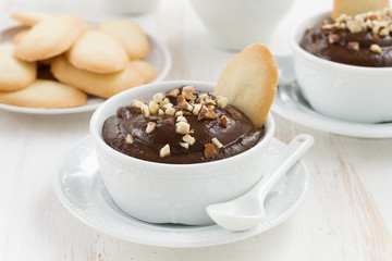 chocolate mousse with biscuits and nuts