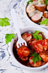 Fried sliced sausages