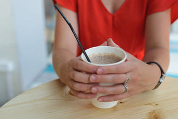 hand derat cup of cocoa