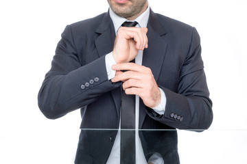 Man adjusting his suit 