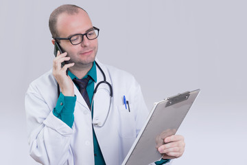 Doctor speaking on a cell phone 