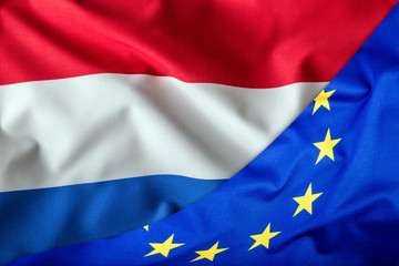 Flags of the  Netherlands and the European Union. Netherlands Flag and EU Flag. World flag money concept.