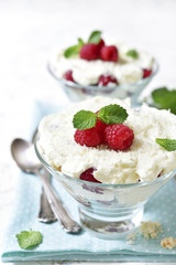 Traditional english dessert eton mess with fresh raspberry.